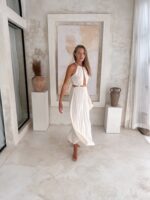 elegancka sukienka wiązana biała długa